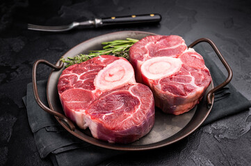 Freshly cross cut shank osso buco, ossobuco meat featuring succulent meat and bone marrow, waiting...
