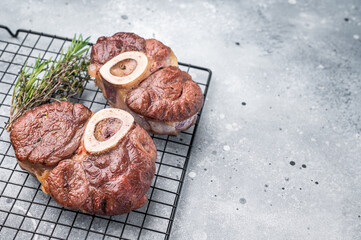 Tender veal osso buco, cross cut shank simmered in rich sauce, a timeless recipe that delights the...
