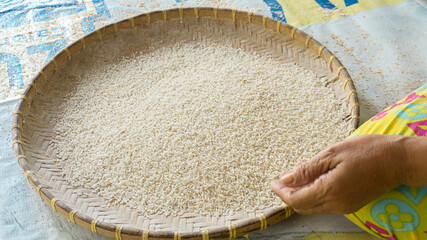 White Rice Grains In A Bamboo Basket