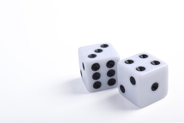 Two white dice isolated on white background