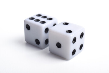 Two white dice isolated on white background