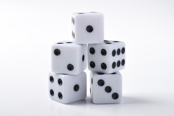 Five white dice on white background, symbolizing luck, chance, probability, and gaming concepts for board games