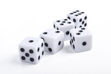 Five white dice on white background, symbolizing luck, chance, probability, and gaming concepts for board games