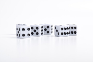 White dice on white background, symbolizing luck, chance, probability, and gaming concepts for...