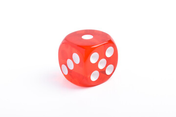 One red game dice isolated on white background