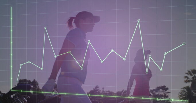Two female golfers wearing polos and caps walking along golf fairway, with data grid overlay