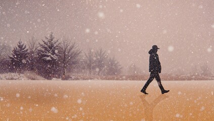 Silhouette of a Man Walking in Snow