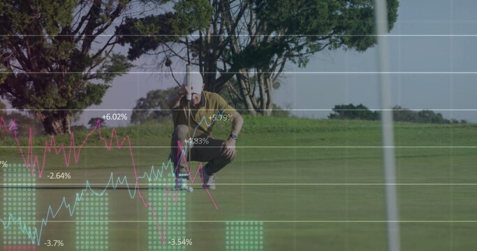 Golfer wearing white cap studying ball line with putter in putting green, finance overlay - Powered by Adobe