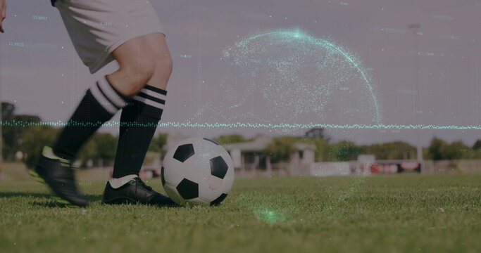 Dribbling female player controlling ball on grass field in neon cleats, with green digital overlay