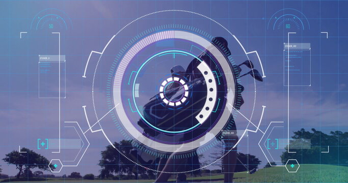 Golfer swinging club at golf ball on tee box, with coach watching, augmented reality HUD overlays