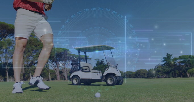 Male golfer aligning club and ball on fairway near golf cart, with digital HUD, copy space