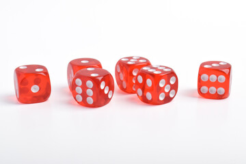 Many red dices isolated on white background