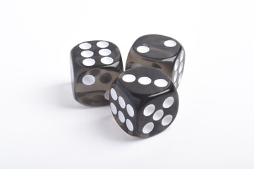 Three black dices isolated on white background