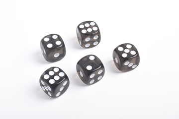 Many black dices isolated on white background