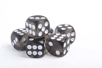 Many black dices isolated on white background