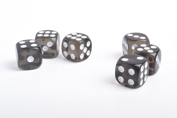 Many black dices isolated on white background