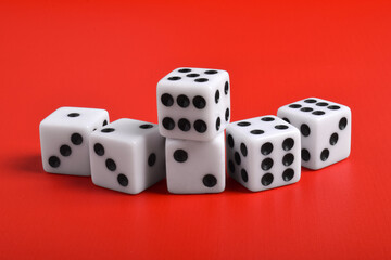 Many dices isolated on red background