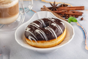 Delicous sweet donut with chocolate glaze