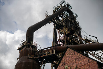 Abandoned Heavy Industrial Ruins with Large Blast Furnace in Steelworks