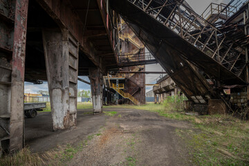Abandoned Heavy Industrial Ruins with Large Blast Furnace in Steelworks