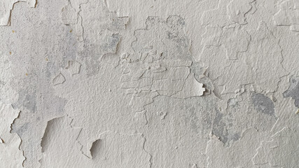 Broken wall texture with horizontal alignment and visible weathering on concrete surface, suitable for use in rustic or worn visual compositions.