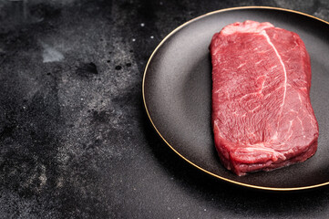 Fresh raw Rump beef steak, organic meat. black background. top view