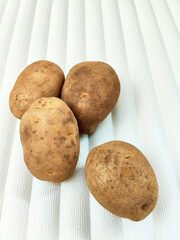 Authentic Indonesian Potatoes with Visible Soil on Skin