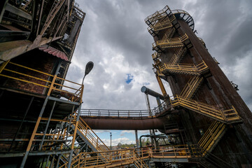 Abandoned Heavy Industrial Ruins with Large Blast Furnace in Steelworks