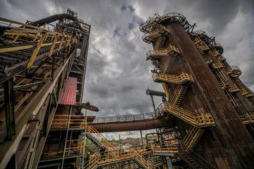 Abandoned Heavy Industrial Ruins with Large Blast Furnace in Steelworks