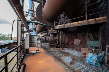 Abandoned Heavy Industrial Ruins with Large Blast Furnace in Steelworks