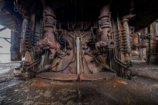 Abandoned Heavy Industrial Ruins with Large Blast Furnace in Steelworks