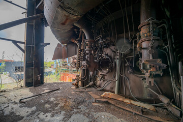 Abandoned Heavy Industrial Ruins with Large Blast Furnace in Steelworks