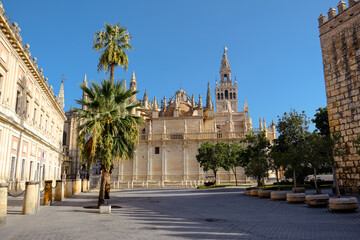 Seville Cathedral and Giralda Tower during Beautiful Sunny Day in Seville, Spain