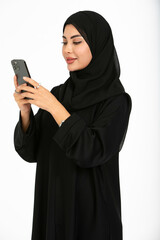 Portrait of an arab woman on a white background using mobile.