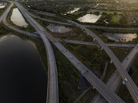 Aerial view of the vibrant sawgrass interchange with elevated roadways slicing through the landscape, connecting to Sawgrass Mills mall, Sunrise, Florida, United States.