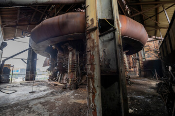 Abandoned Heavy Industrial Ruins with Large Blast Furnace in Steelworks