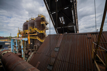 Abandoned Heavy Industrial Ruins with Large Blast Furnace in Steelworks