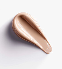 Creamy foundation product displays smooth texture and natural skin tone coverage.