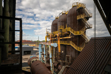 Abandoned Heavy Industrial Ruins with Large Blast Furnace in Steelworks