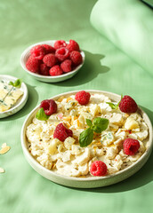 fresh cauliflower salad with dor blue cheese and raspberries