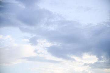 white fluffy clouds against a blue sky