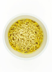Instant noodles in plastic cup isolated on white background. Above angle