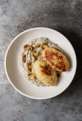 cutlets with mushroom puree and champignons