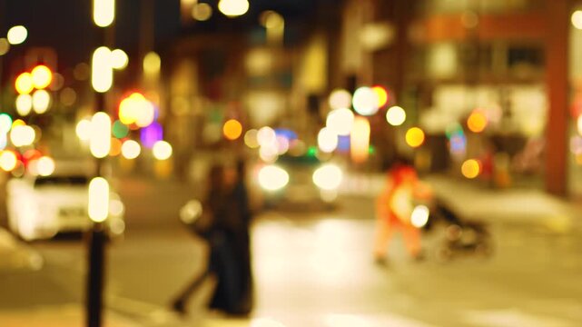 Blurred pedestrians dangerously crossing street in front of approaching car. Out of focus figures running through traffic under glowing lights. Defocused people dashing across urban road with