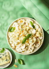 fresh cauliflower salad with cheese