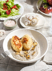 cutlets with mushroom puree and champignons