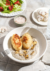cutlets with mushroom puree and champignons