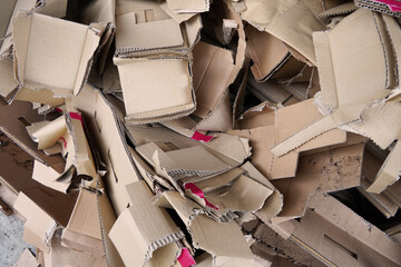 Pile of dismantled and loosely flattened cardboard boxes for recycling