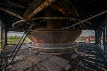 Abandoned Heavy Industrial Ruins with Large Blast Furnace in Steelworks