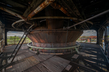 Abandoned Heavy Industrial Ruins with Large Blast Furnace in Steelworks